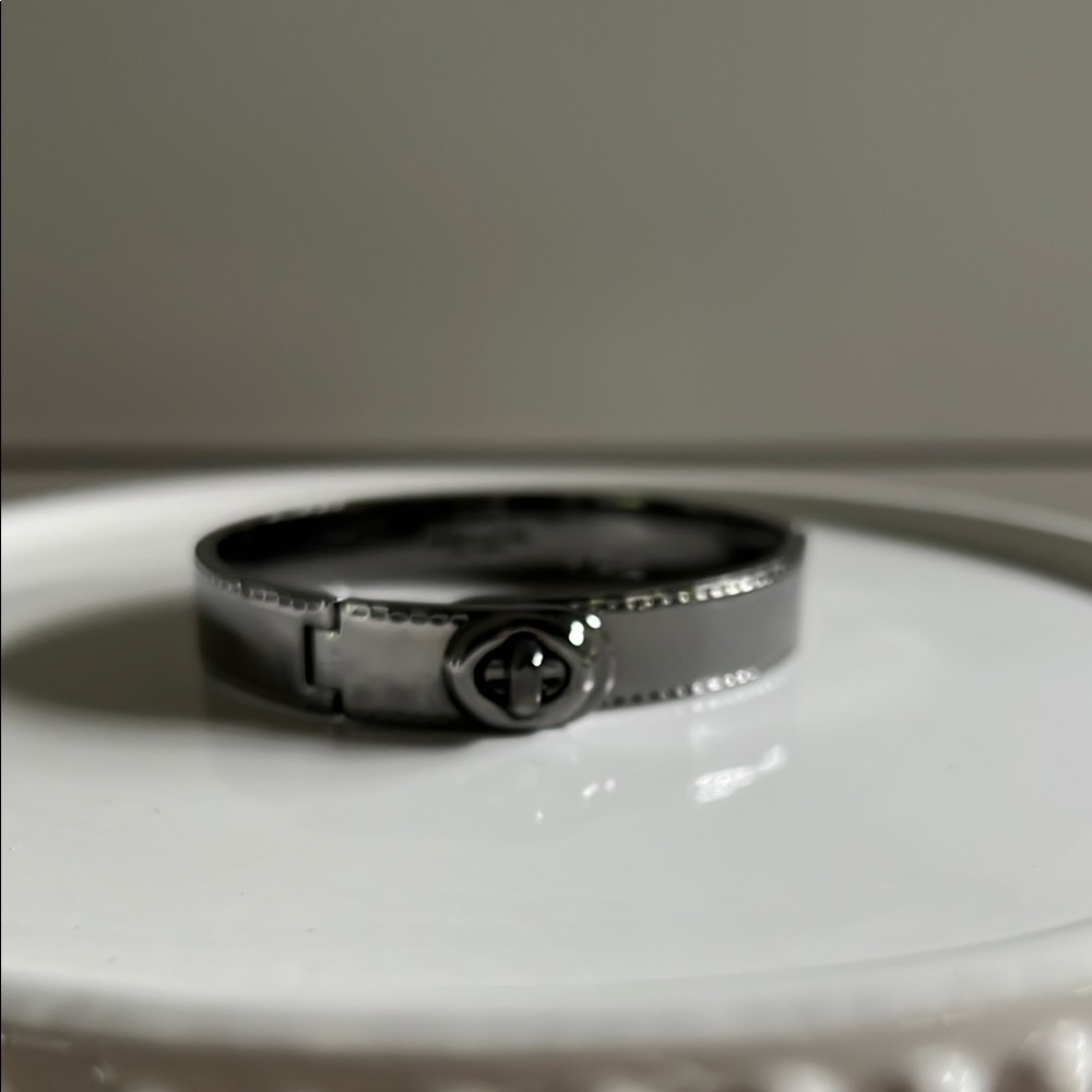 Women’s Coach black bangle bracelet
